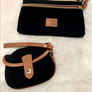 navy blue Dooney and Burke canvas clutch set.